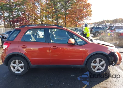 2009 Suzuki Sx4 Technology z USA, uszkodzony, nr VIN JS2YB413895100110